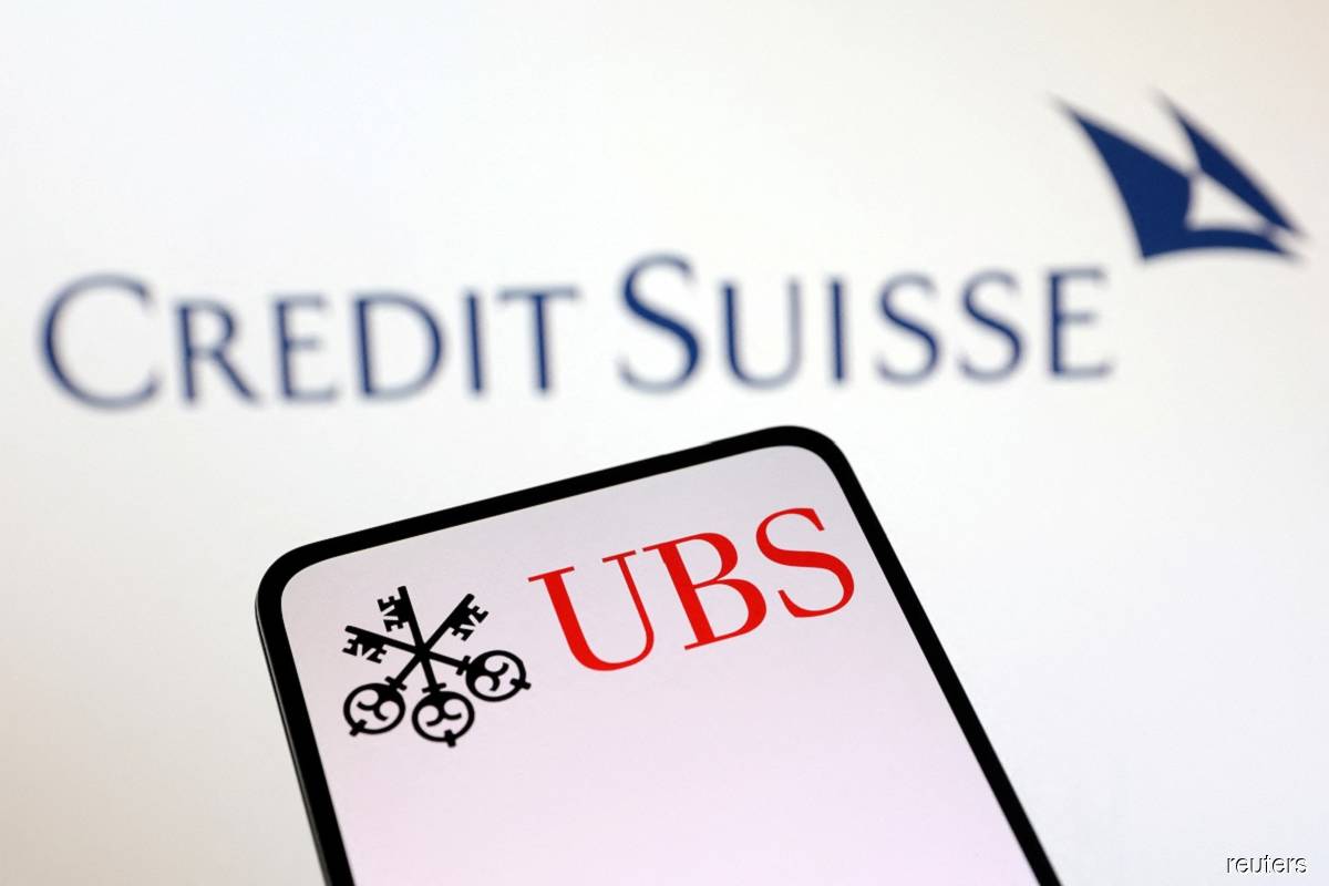  UBS Group and Credit Suisse logos are seen in this illustration taken March 18, 2023.(Reuters pic)